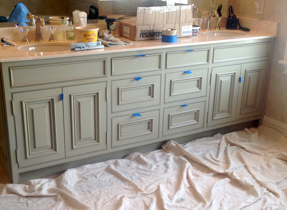 Classic Custom Cabinetry and Millwork being installed and painted