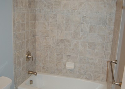 New tile work, fixtures, and tub